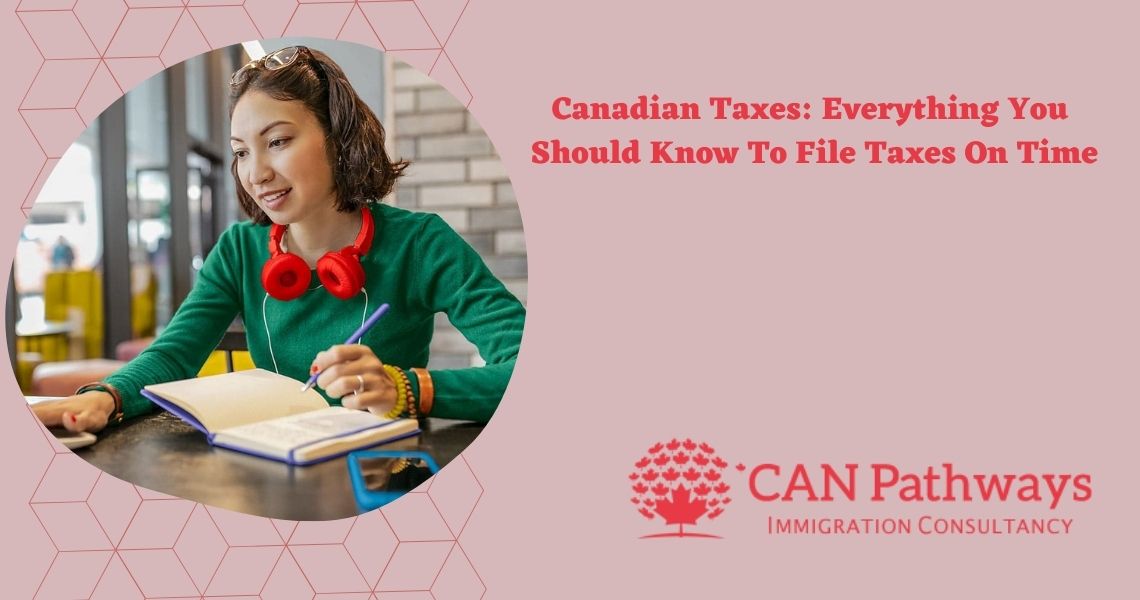 A girl studen is studying with headphones in neck